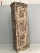 An Indian carved hardwood tall side cabinet, width 72cm, depth 48cm, height 218cm