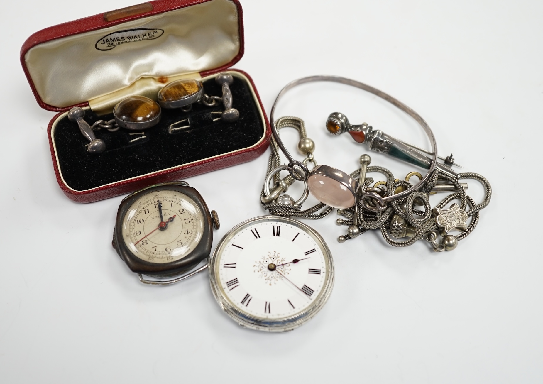 A pair of 925 and tiger's eye quartz set cufflinks, a silver and Scottish hardstone set brooch, a