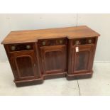 A Victorian inverse breakfront mahogany sideboard, width 124cm, depth 48cm, height 76cm