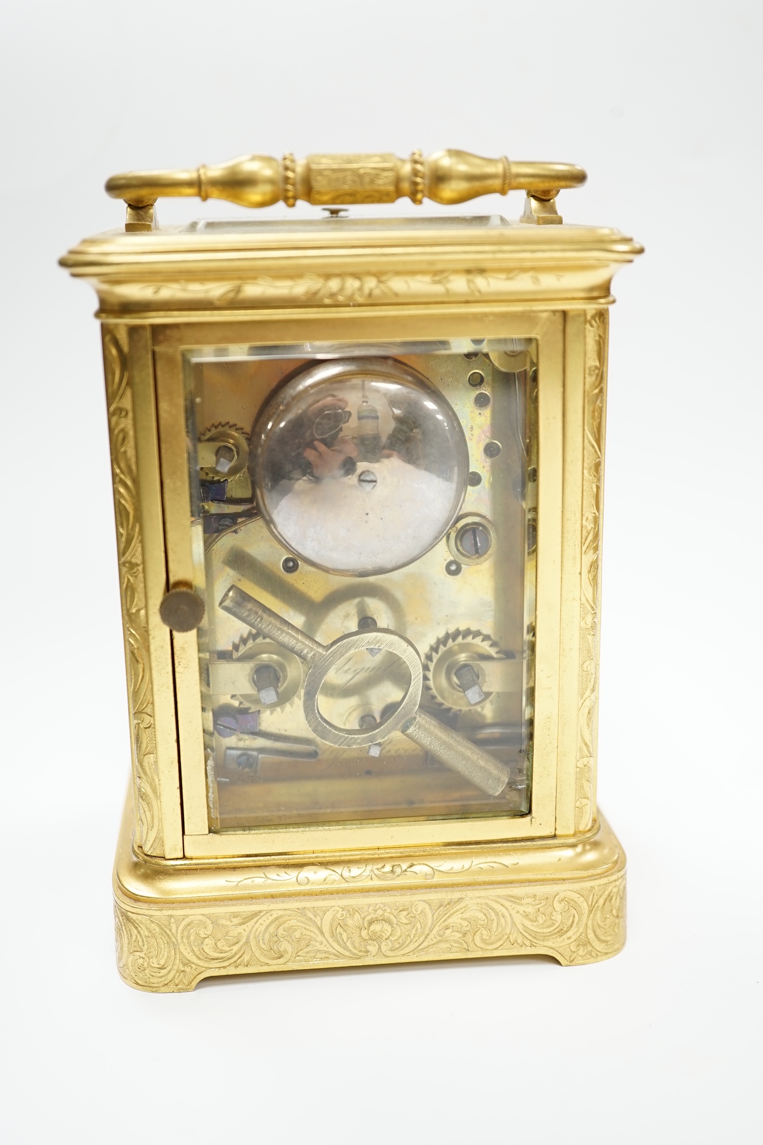 A late 19th century engraved brass cased repeating alarm carriage clock, with Russian retailer, - Image 3 of 5