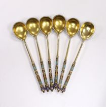 A set of six late 19th century Russian 84 zolotnik gilt white metal and cloisonné enamel coffee