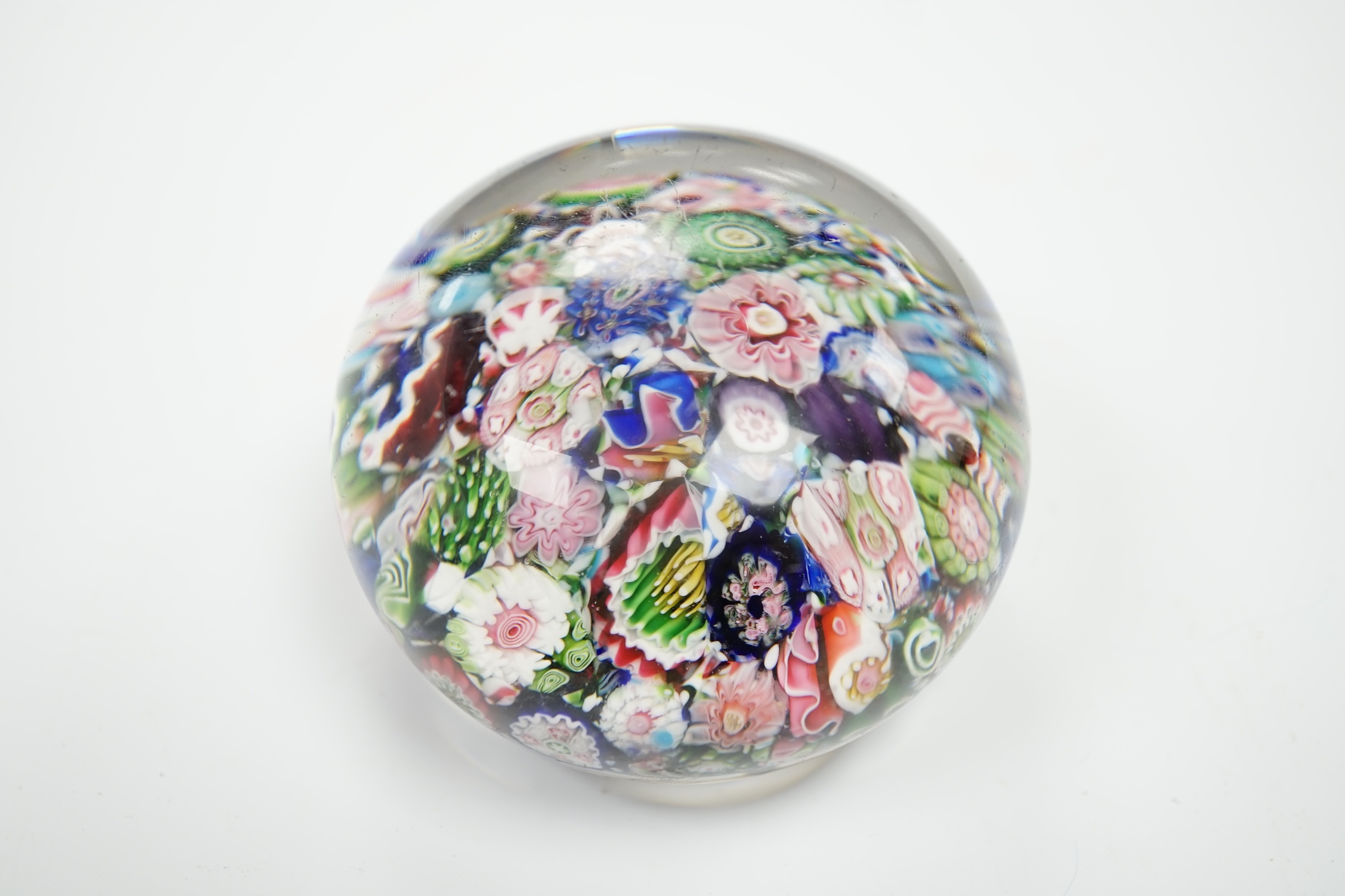 A Clichy scrambled glass paperweight with unusual pink and green rose, 6.5cm in diameter - Image 2 of 3