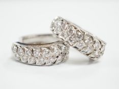 A modern pair of white metal and diamond cluster set half hoop earrings, 20mm, gross weight 8.9