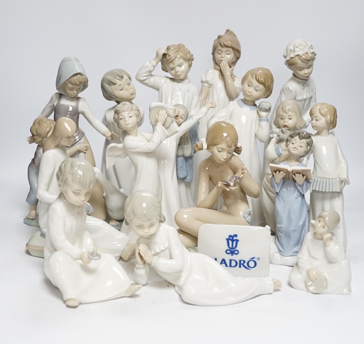 A group of various Lladro figures (16 + plaque)