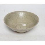 A Chinese carved shipwreck bowl, Song dynasty, 17cm diameter