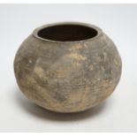 A Chinese black pottery jar, Han dynasty, 15cm tall