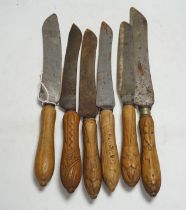 Six Victorian wood handled bread knives, longest 35.5cm