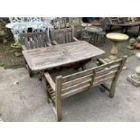 A rectangular weathered teak garden table, width 152cm, depth 86cm, height 74cm, together with a