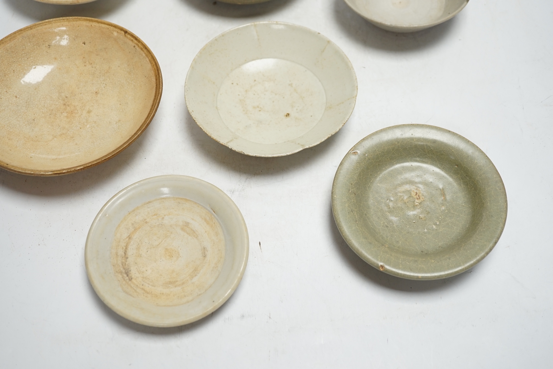 A group of seven Chinese Ding type, qingbai and celadon dishes, Song-Yuan dynasty, largest 15.5cm - Image 4 of 5