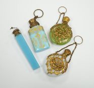A group of four glass scent bottles with gilt metal mounts, largest 9cm high