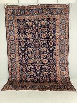 A Kashan blue ground carpet, 290 x 195cm