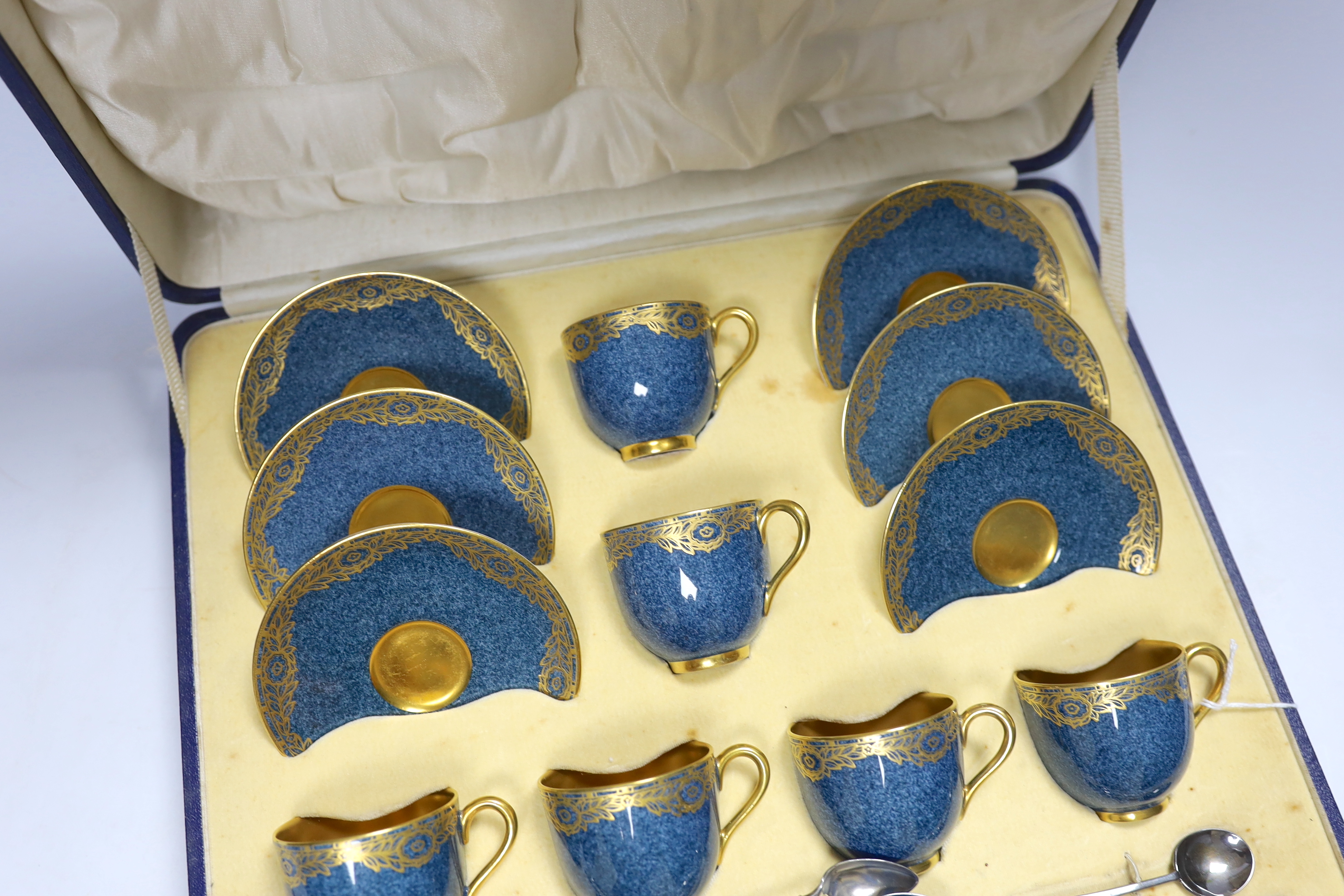 A cased Royal Worcester gilt and powder blue six piece coffee set with silver teaspoons, set of - Image 3 of 4