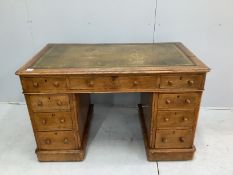 A small Victorian oak pedestal desk, width 122cm, depth 70cm, height 77cm