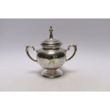 A late 19th century Russian 84 zolotnik two handled sugar bowl and hinged cover, unknown assay