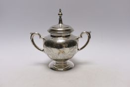 A late 19th century Russian 84 zolotnik two handled sugar bowl and hinged cover, unknown assay