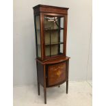 An Edwardian inlaid mahogany bowfront display cabinet, width 66cm, depth 42cm, height 185cm