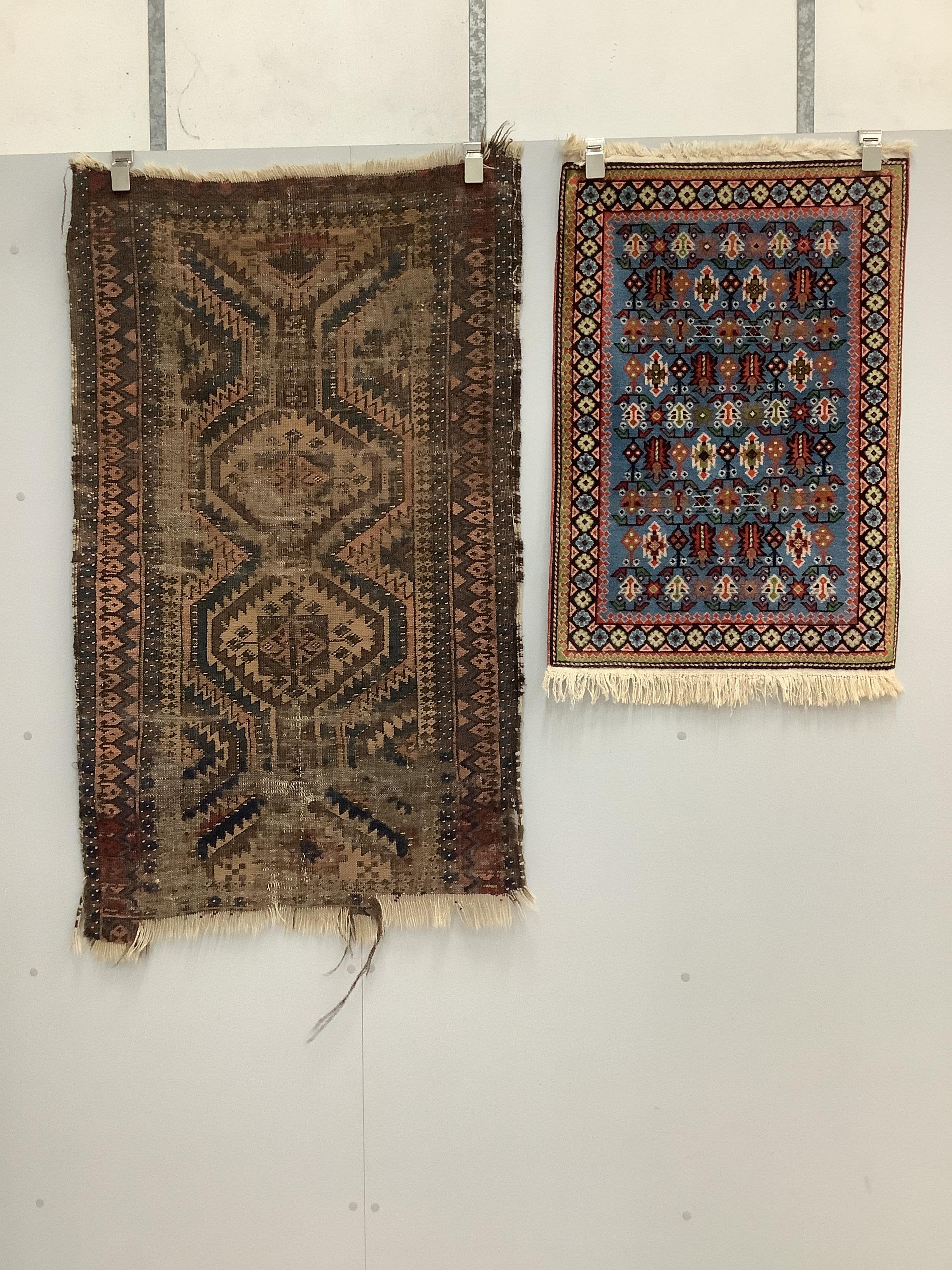 A Caucasian style red ground rug, a North West Persian figural rug, an antique Shirvan rug and one - Image 2 of 2
