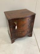 A small Queen Anne revival walnut serpentine three drawer chest, width 63cm, depth 48cm, height