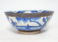 A Chinese blue and white crackle glazed bowl, early 20th century, 21cm diameter