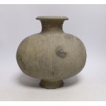 A Chinese grey pottery 'cocoon' jar, Han dynasty, 27cm