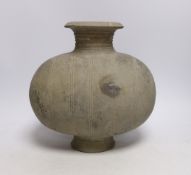 A Chinese grey pottery 'cocoon' jar, Han dynasty, 27cm