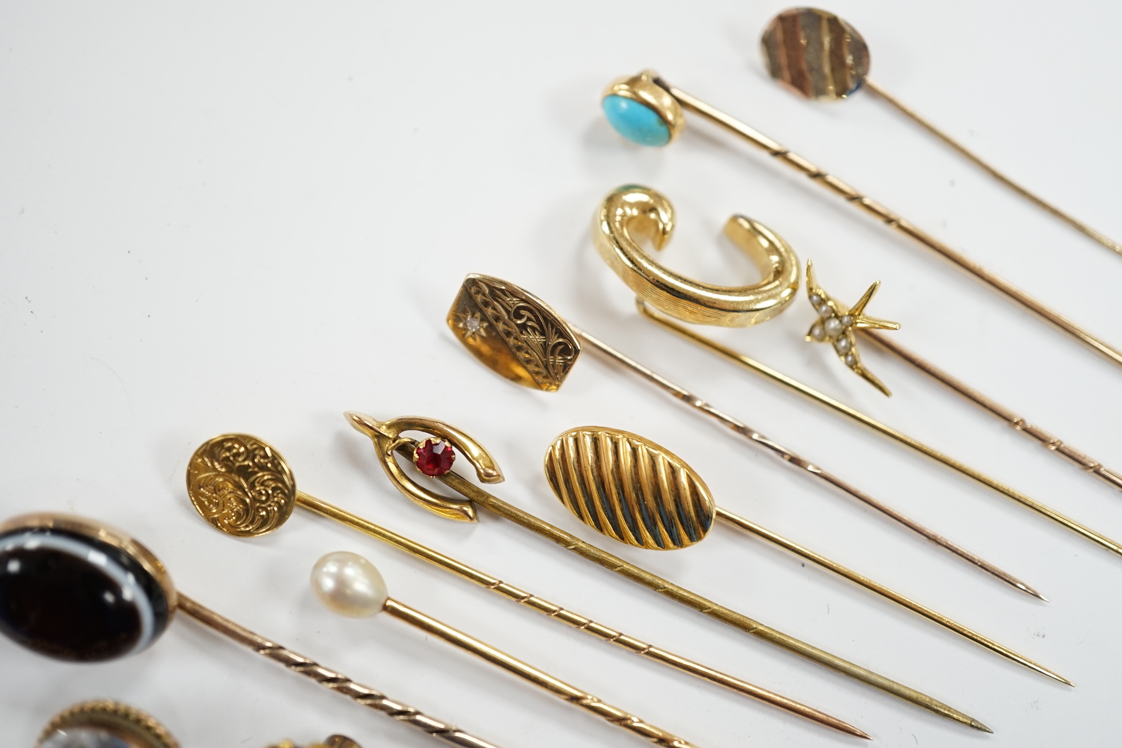 Fifteen assorted mainly early 20th century yellow metal and gem set stick pins, including diamond, - Image 3 of 11