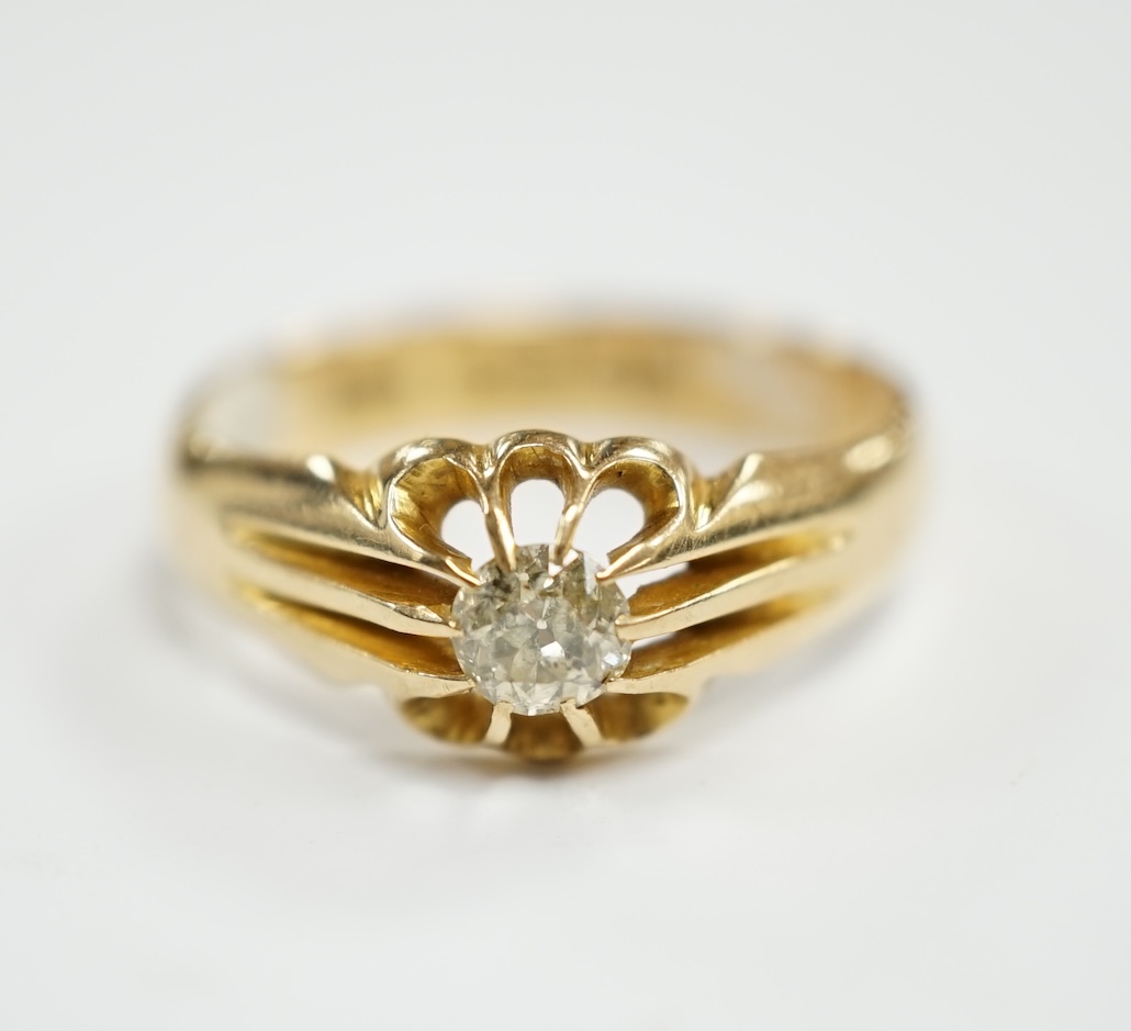 A George V 18ct gold and claw set solitaire diamond ring, size Q, gross weight 4.9 grams.
