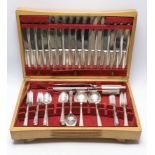 An Elizabeth II almost complete silver canteen of cutlery for eight by Cooper Brothers & Sons,