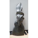 A large Shona carved soapstone stone sculpture of an antelope, unsigned, 78cm high