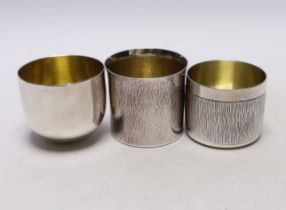 A modern Irish silver tumbler cup by Royal Irish Silver Co, height 59mm and two other modern