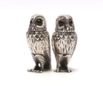 A pair of Elizabeth II novelty silver condiments, each modelled as an owl, maker WW, London, 2008,