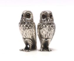 A pair of Elizabeth II novelty silver condiments, each modelled as an owl, maker WW, London, 2008,