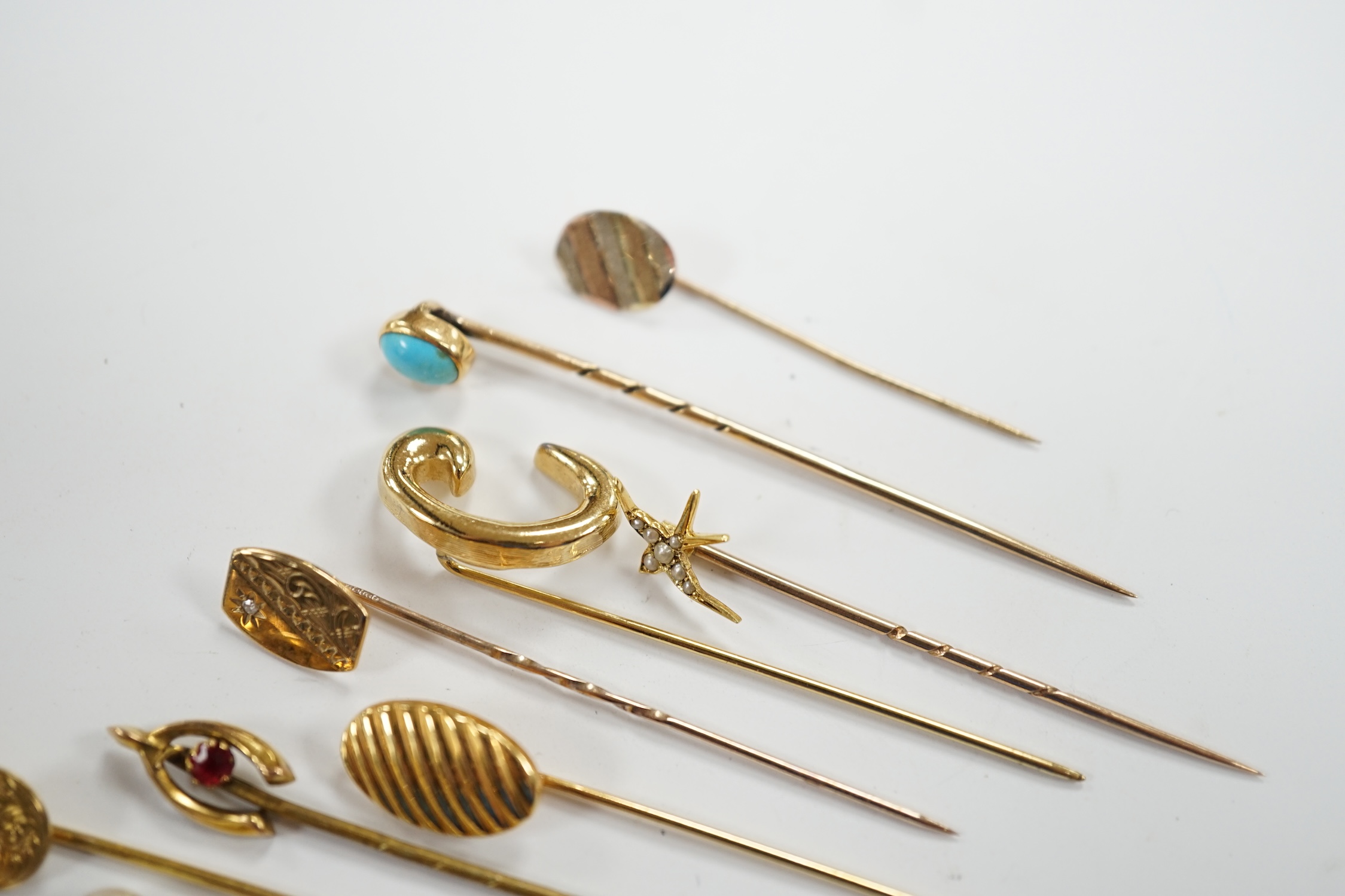 Fifteen assorted mainly early 20th century yellow metal and gem set stick pins, including diamond, - Image 10 of 11