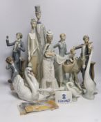 A collection of various Lladro figures including composers, swans, etc. tallest 50cm