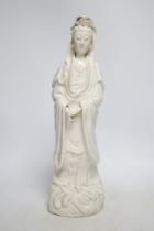 An 18th century Chinese blanc de chine figure of Guanyin, 42cm