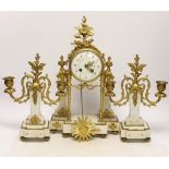 An early 20th century white marble and ormolu clock garniture with Arabic enamelled dial, 42cm high