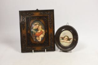 An oval porcelain plaque of mother and child in an ornate frame and a smaller circular porcelain