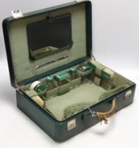 A mid 20th century cased toilet set