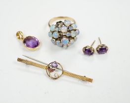 A cased 9ct, three stone amethyst and ruby set bar brooch, 49mm, a 14k and opal cluster set dress