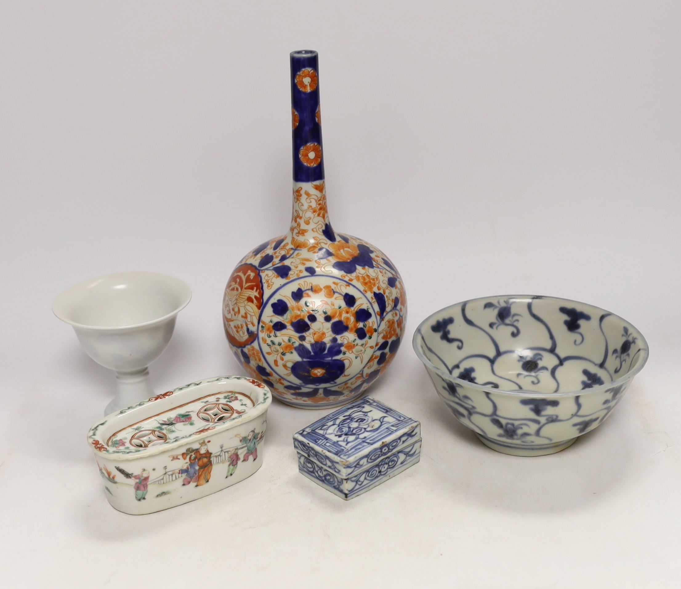 A Chinese Tek Sing Cargo bowl, a Chinese famille Rose Jar and cover, late 19th century, a stem cup