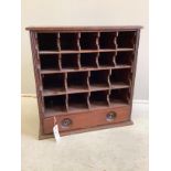 A Victorian Ferris & Co Bristol mahogany pigeonhole dispensing cabinet with compartmented drawer,