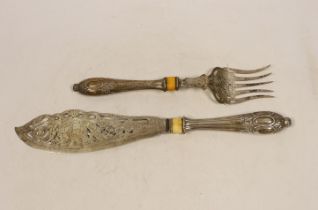 A pair of Victorian silver fish servers engraved and pierced decoration and silver handles (filled),
