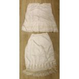 Two 1910-1920 cream silk and lace ladies floor length petticoats, one with a deep border of