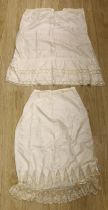 Two 1910-1920 cream silk and lace ladies floor length petticoats, one with a deep border of