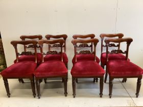 A set of eight early Victorian mahogany dining chairs, on turned fluted legs