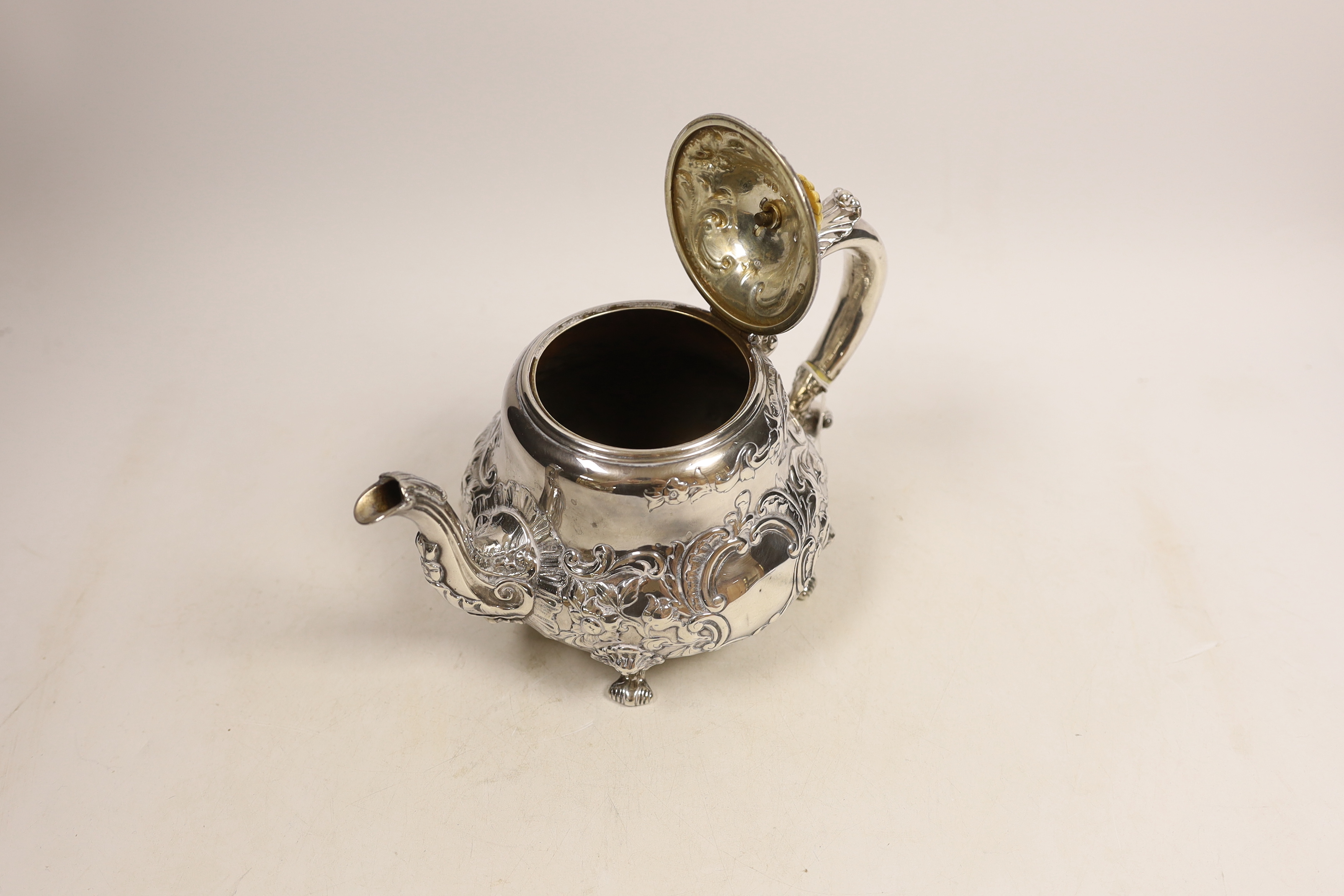 An early Victorian embossed silver teapot, Robert Hennell III, London, 1843, gross weight 22.2oz. - Image 2 of 3