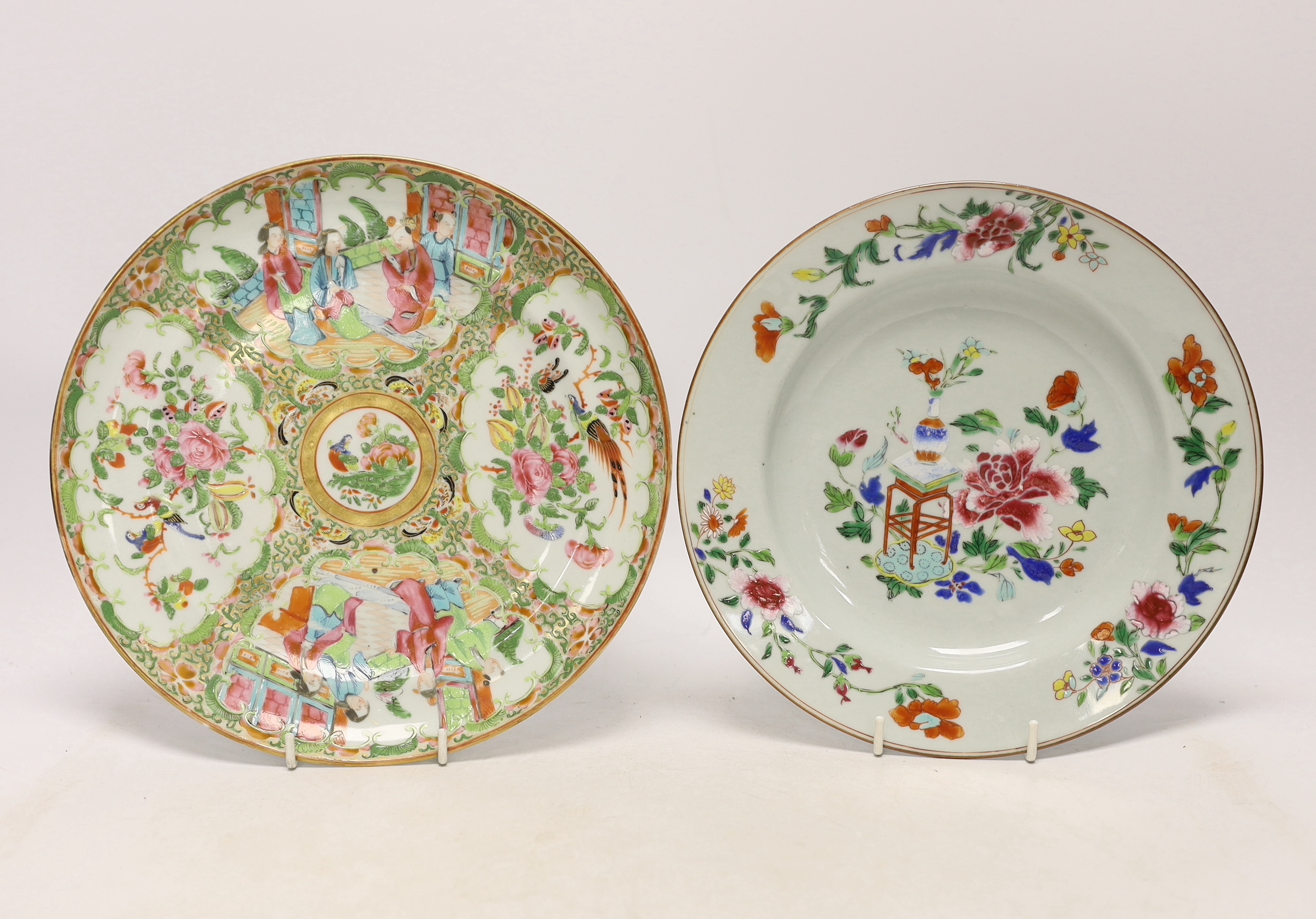 A late 18th century Chinese famille rose plate and a 19th century famille rose plate another,