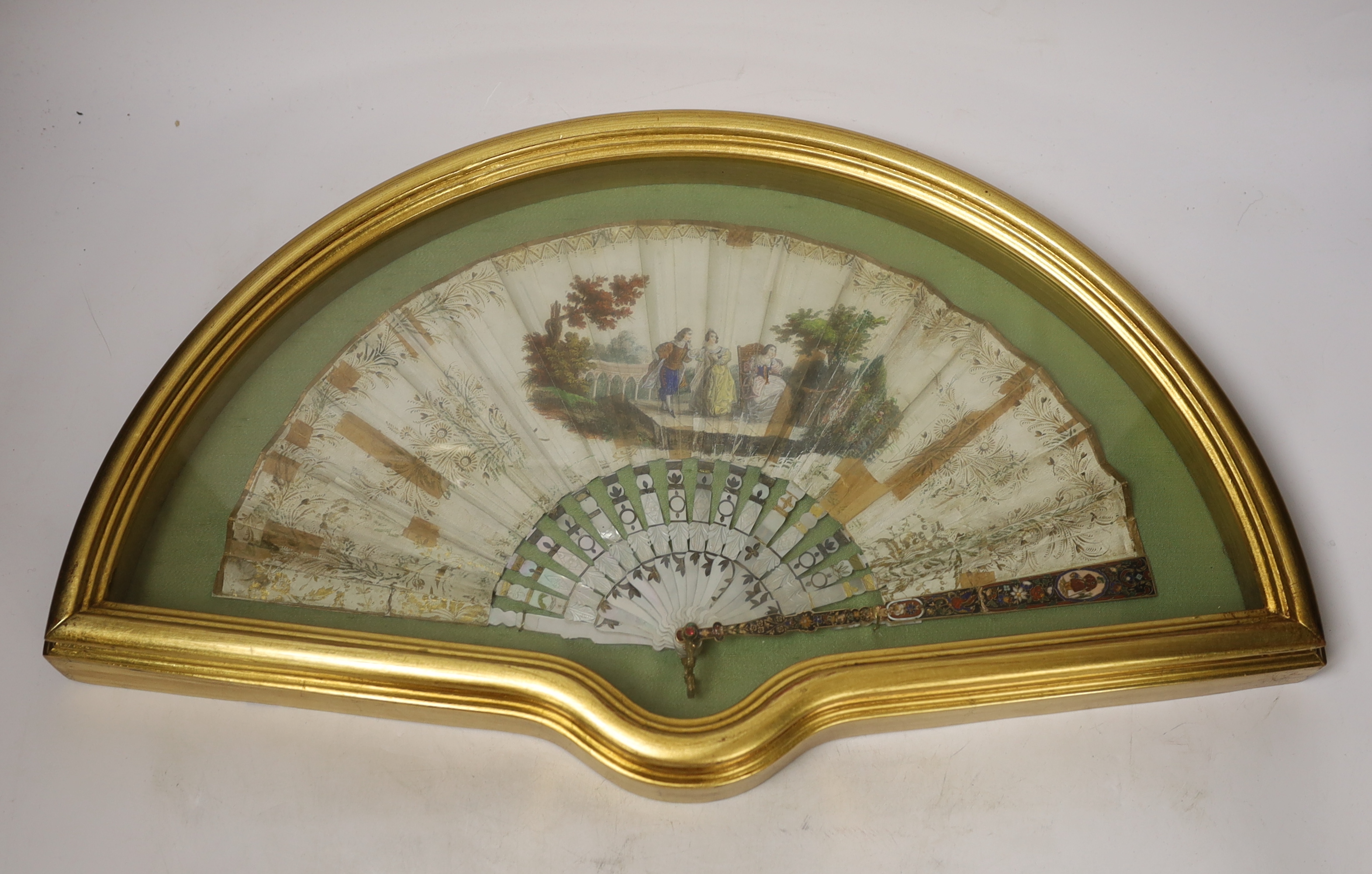A cased early 19th century French mother of pearl, printed and painted fan