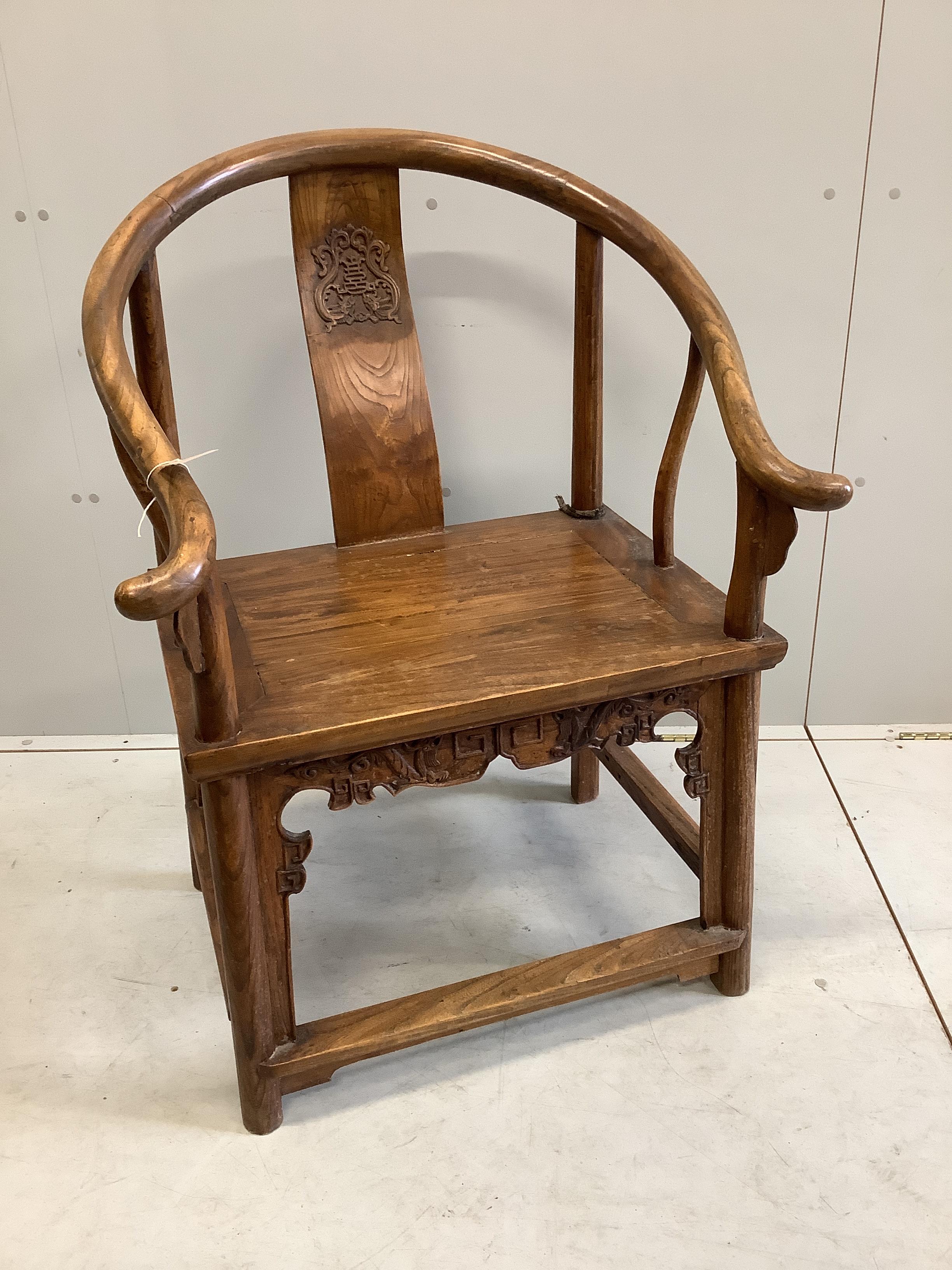 A Chinese elm chair, width 70cm, depth 54cm, height 101cm