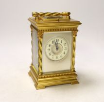 A large early 20th century French gilt metal repeating carriage clock, 17cm, with key